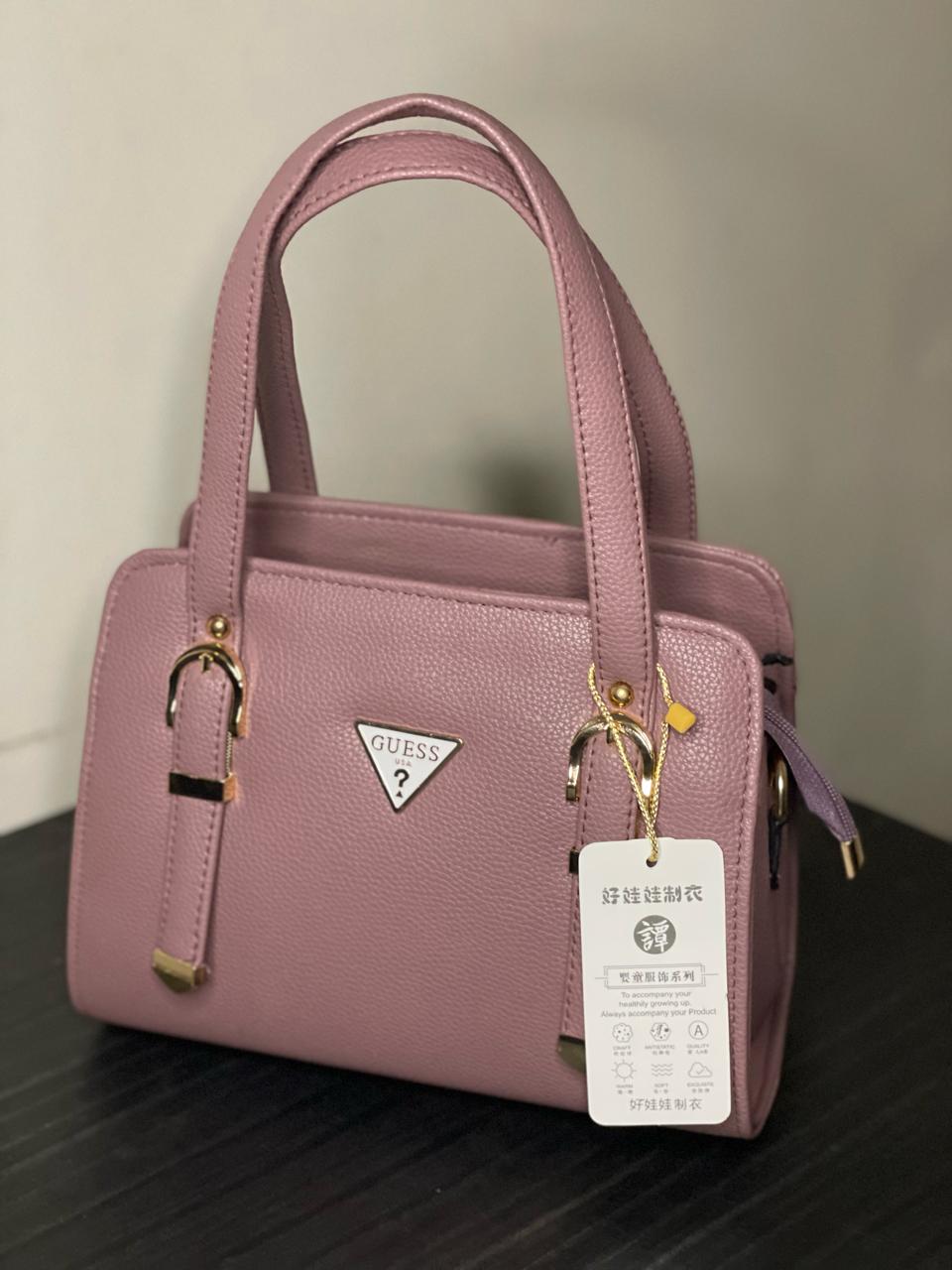 Elevate your style with the Choose Wo's Handbag featuring a sophisticated lychee pattern
