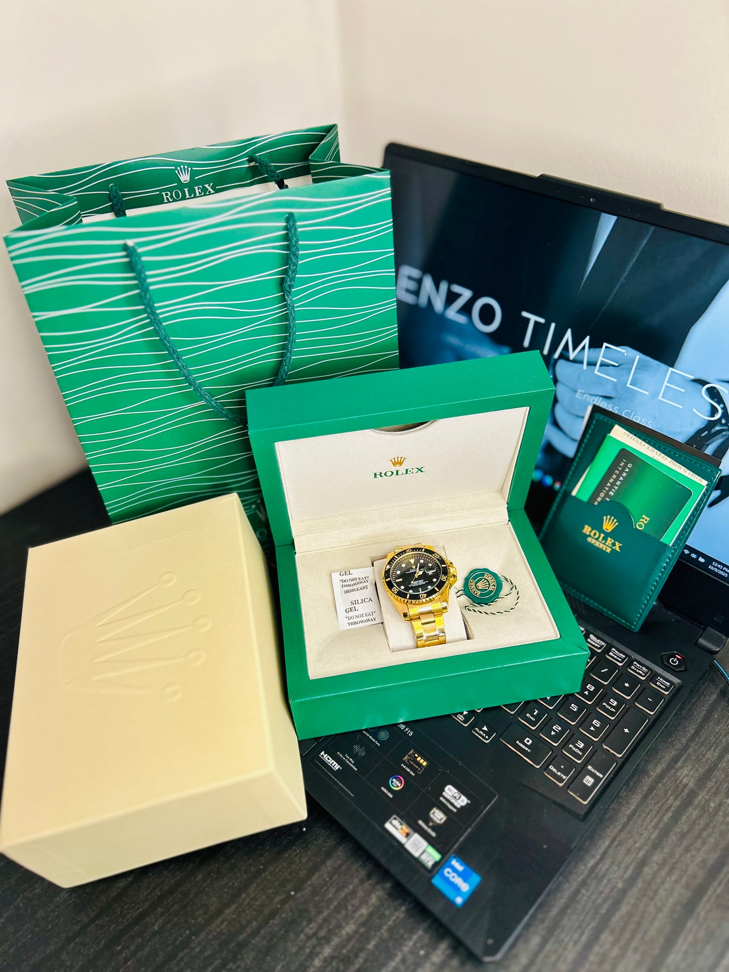 Black Submariner Dial Watch with Gold Chain & Original Rolex Box