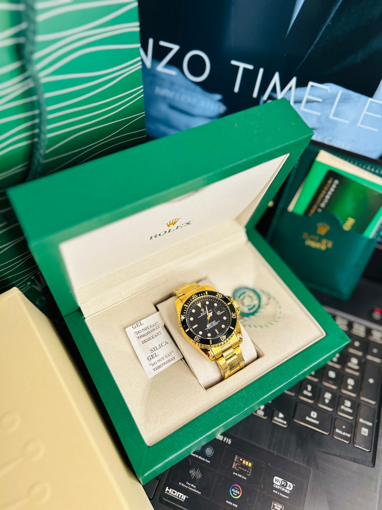Black Submariner Dial Watch with Gold Chain & Original Rolex Box