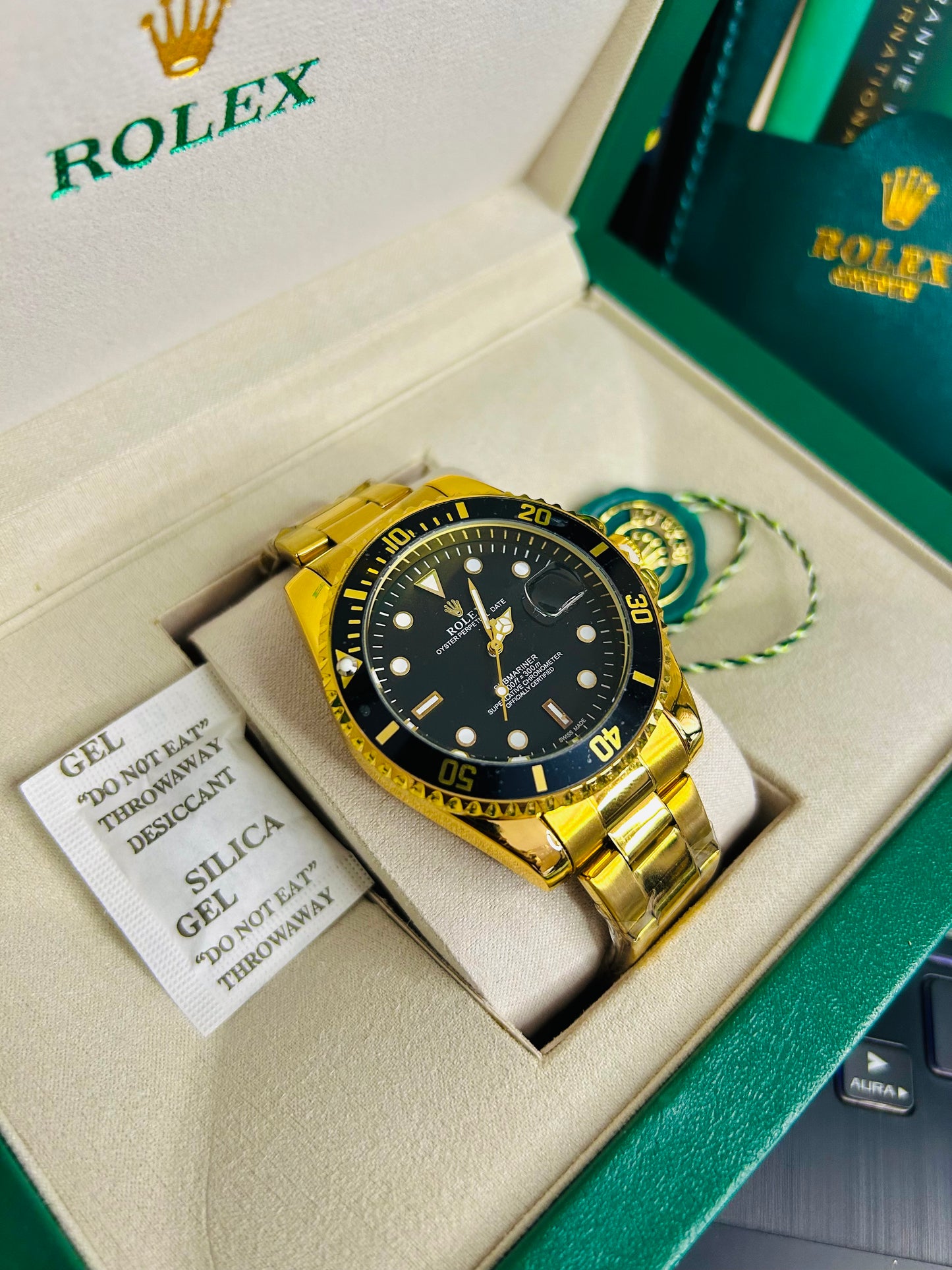 Black Submariner Dial Watch with Gold Chain & Original Rolex Box