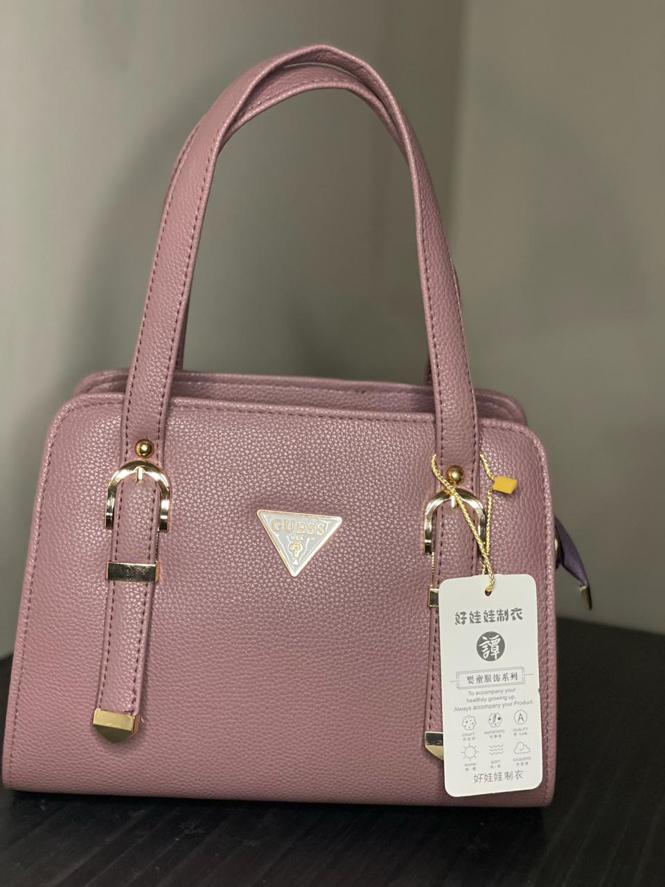 Elevate your style with the Choose Wo's Handbag featuring a sophisticated lychee pattern