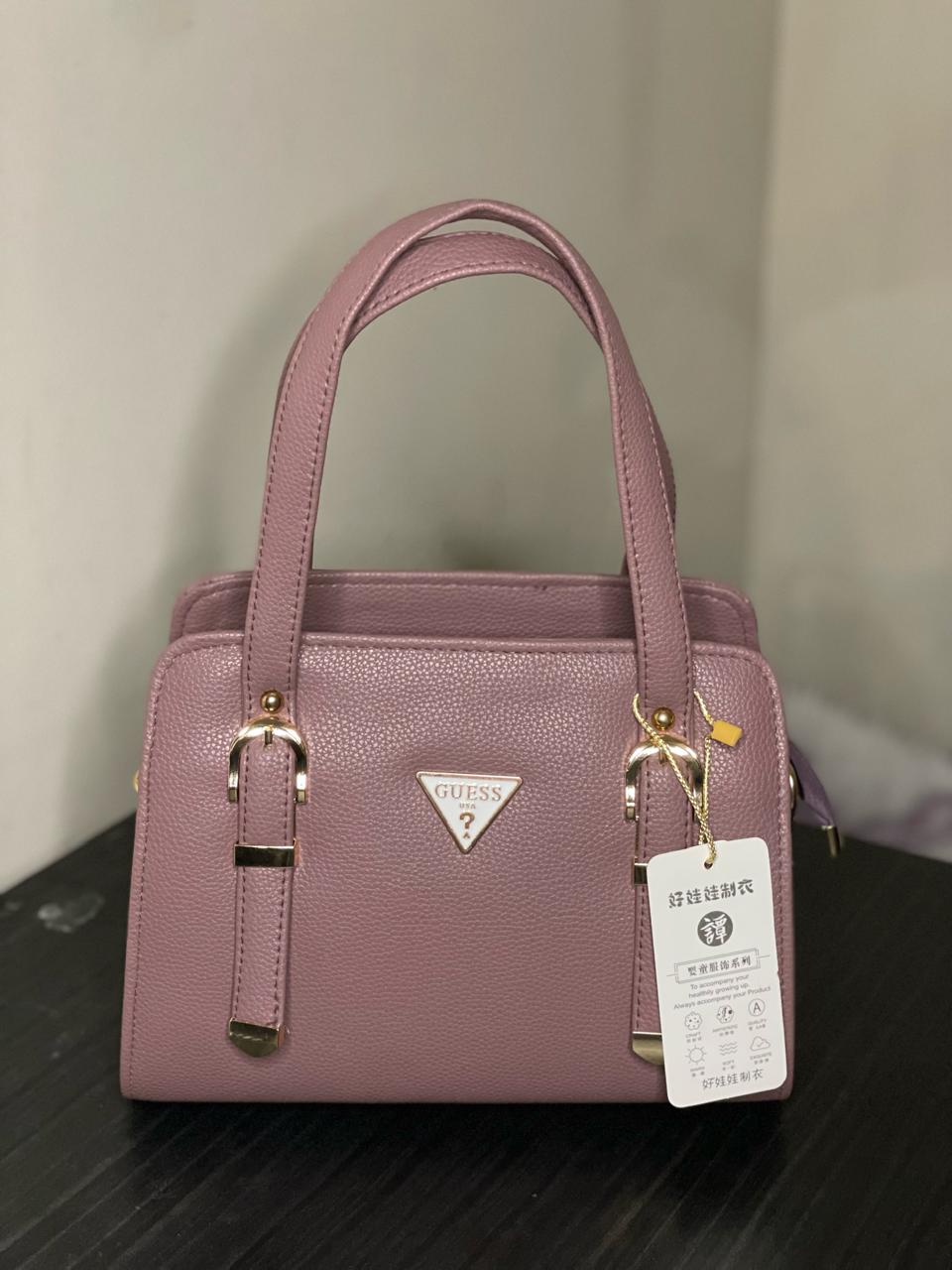 Elevate your style with the Choose Wo's Handbag featuring a sophisticated lychee pattern