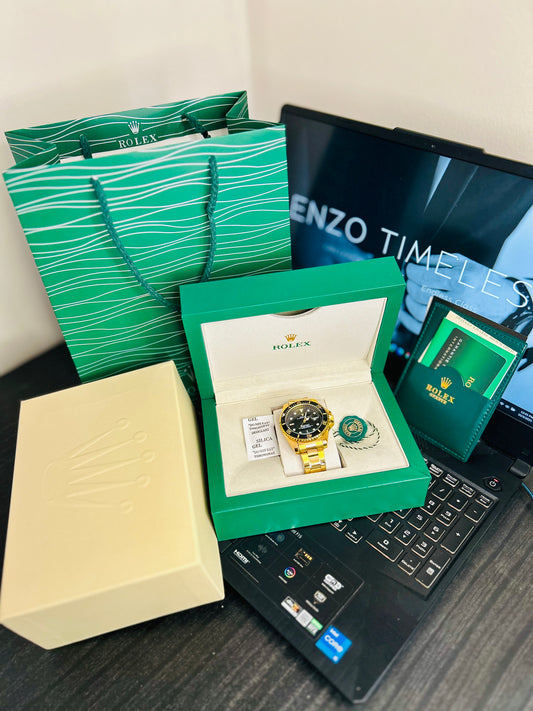 Black Submariner Dial Watch with Gold Chain & Original Rolex Box